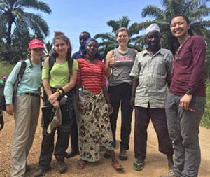 Members of Engineers without Borders in Tanzania with community members.