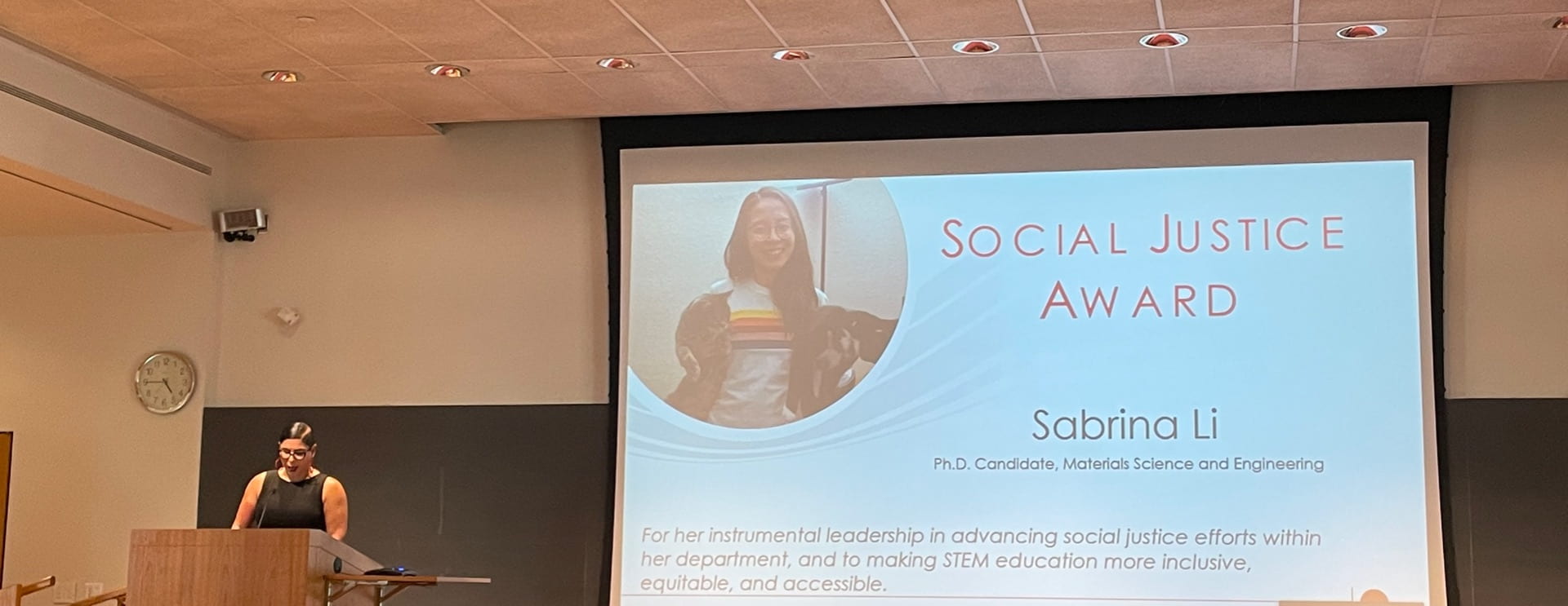 Associate Dean for Inclusion and Student Engagement Sara Xayarath Hernández presenting a Social Justice Award to Sabrina Li (PhD Candidate, Materials Science and Engineering) at the 2022 Graduate Diversity and Inclusion Awards & Recognition Celebration.